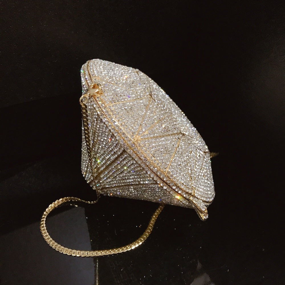 Three-dimensional diamond shape dinner clutch